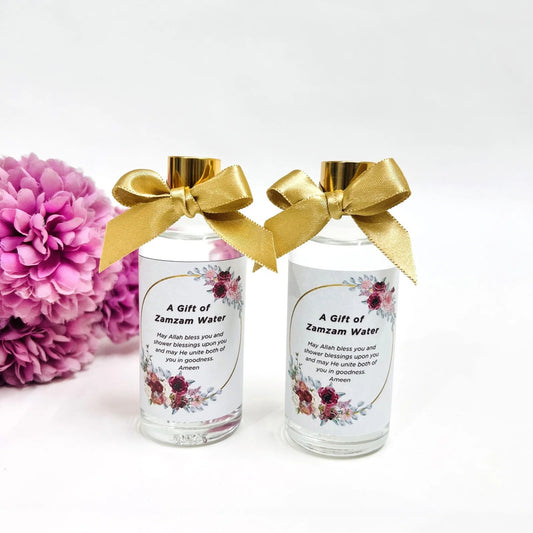 Authentic Zamzam water twin bottle set with custom name labels.