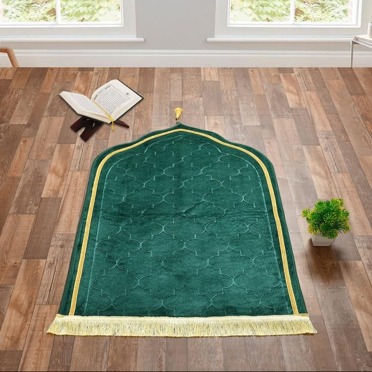 Green velvet prayer mat with dome design and golden detailing, thick and soft for comfortable salah.