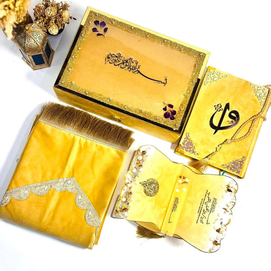 Golden Blitz Barkat-e-Jariyah Quran Gift Set featuring velvet Quran, resin rehal, prayer mat, and tasbih.