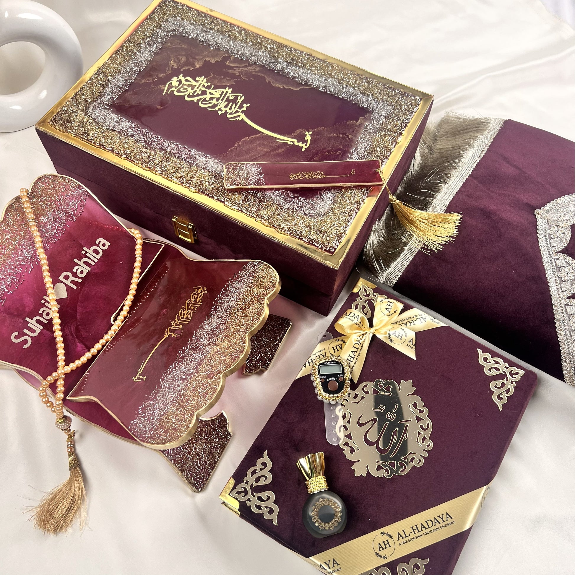 Handmade Quran gift hamper with velvet cover, prayer mat, and resin bookmark.