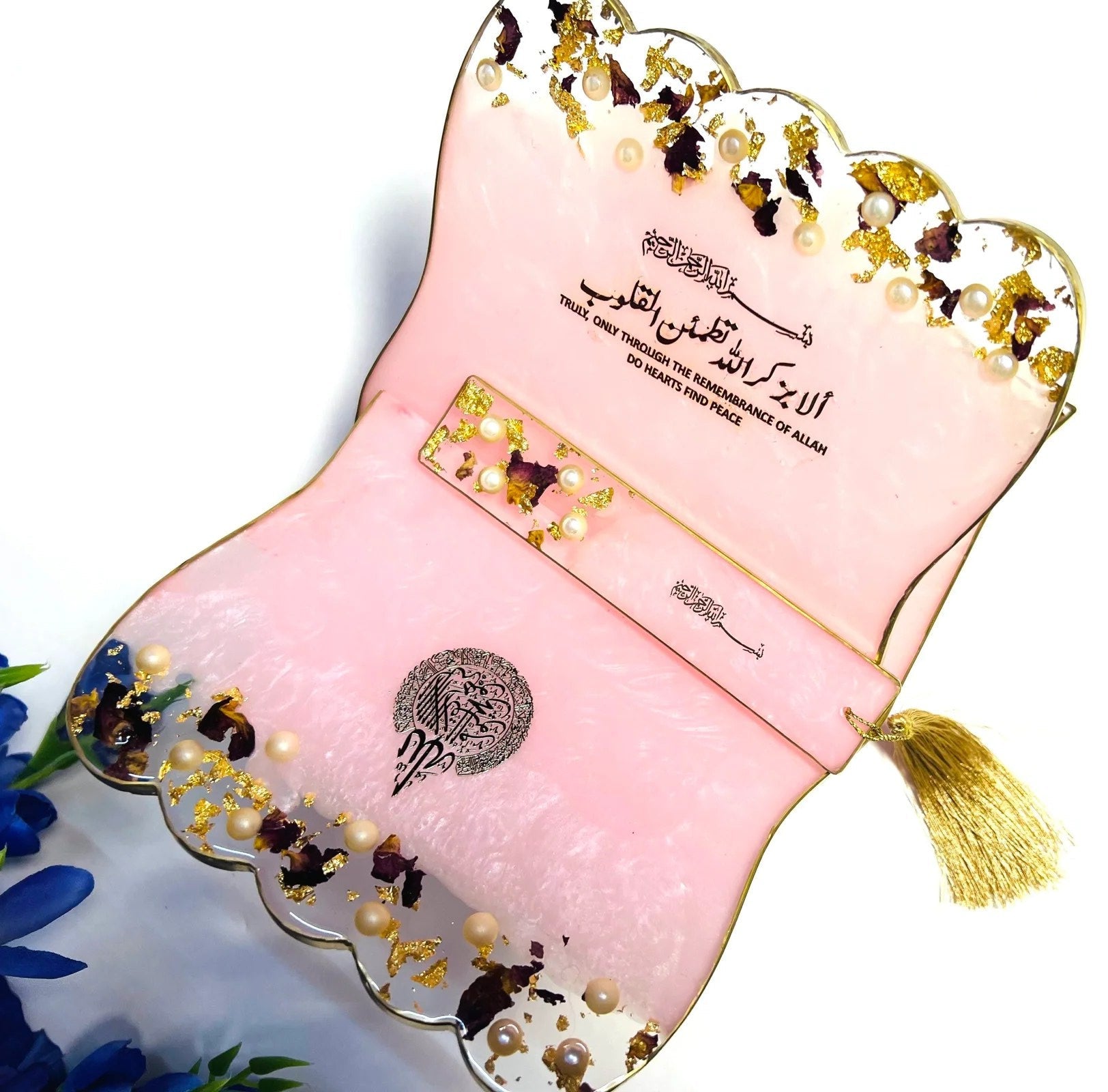 Custom Quran stand crafted from clear resin with real dried flowers and gold accents.