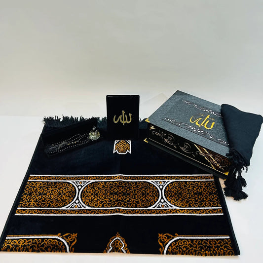 Luxury Islamic gift box for men featuring Quran, Turkish mat, tasbih, attar, and scarf.