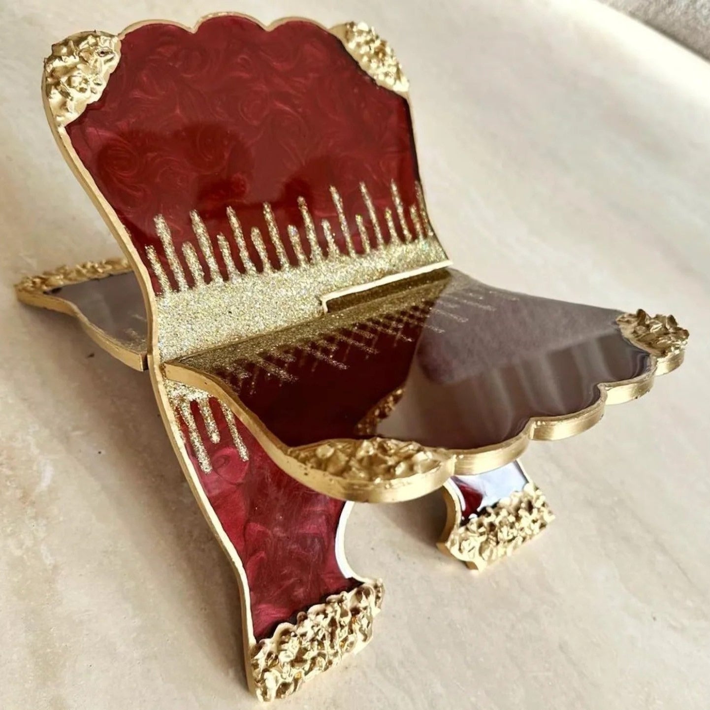 maroon and golden Islamic book stand made of premium resin for Quran display and home decor