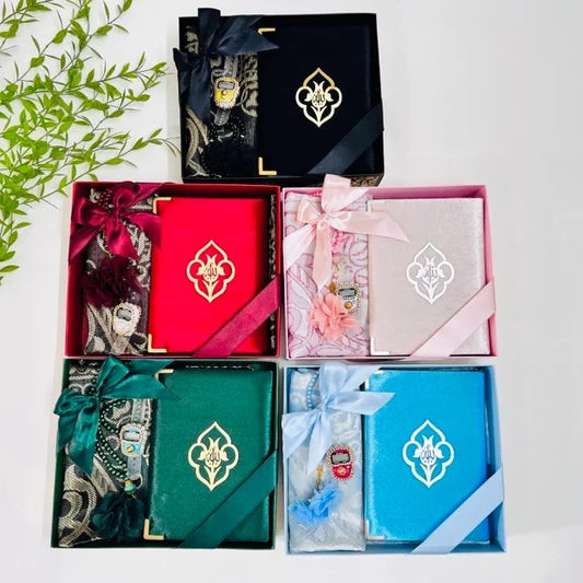 Elegant Islamic gift hamper featuring velvet Quran box and Turkish prayer rug.