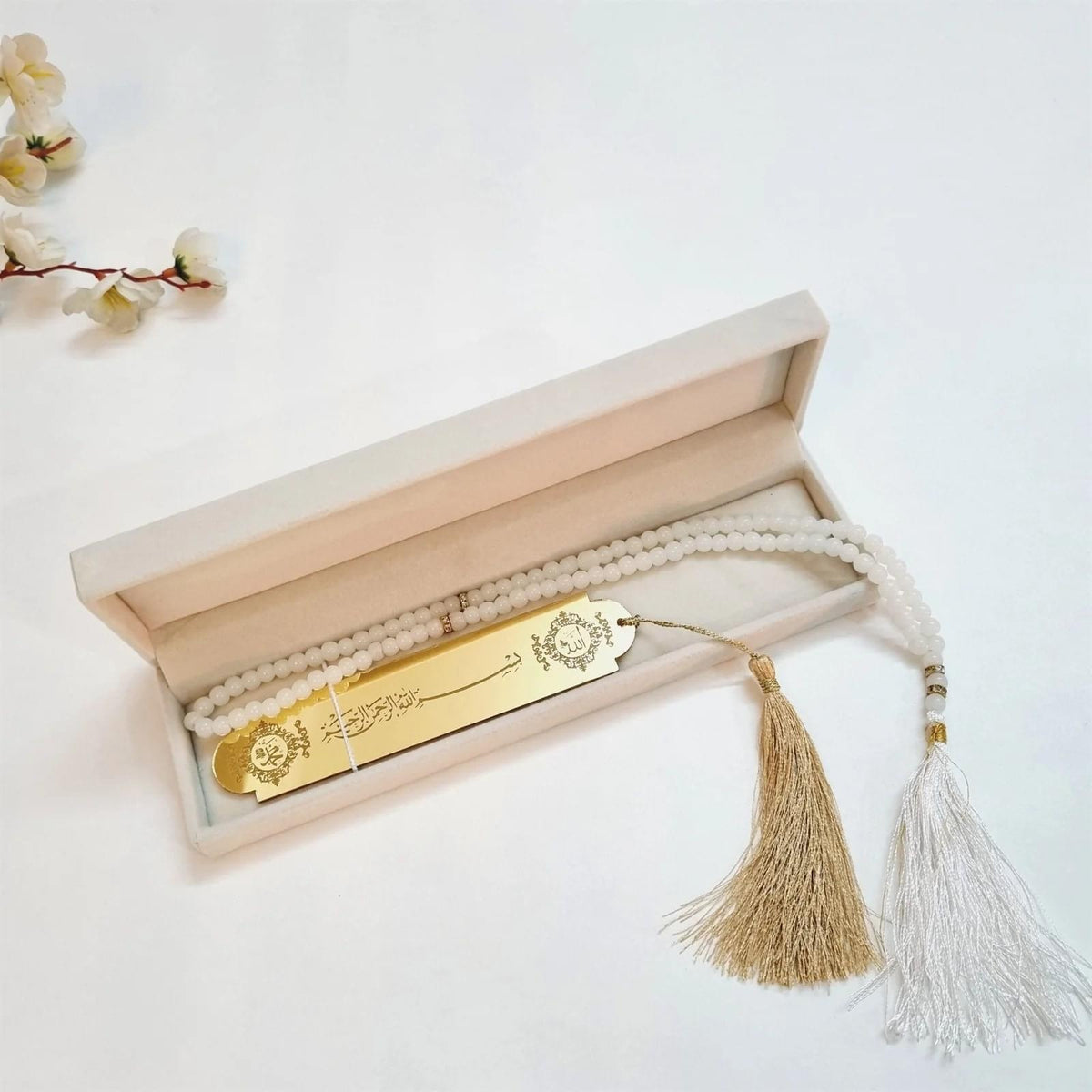 Pearl white velvet keepsake box with crystal tasbih 99 beads and golden engraved Bismillah bookmark.