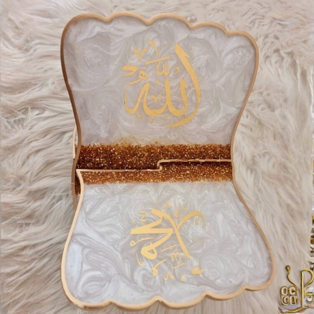 Elegant white and gold resin Quran stand for home or gifting.