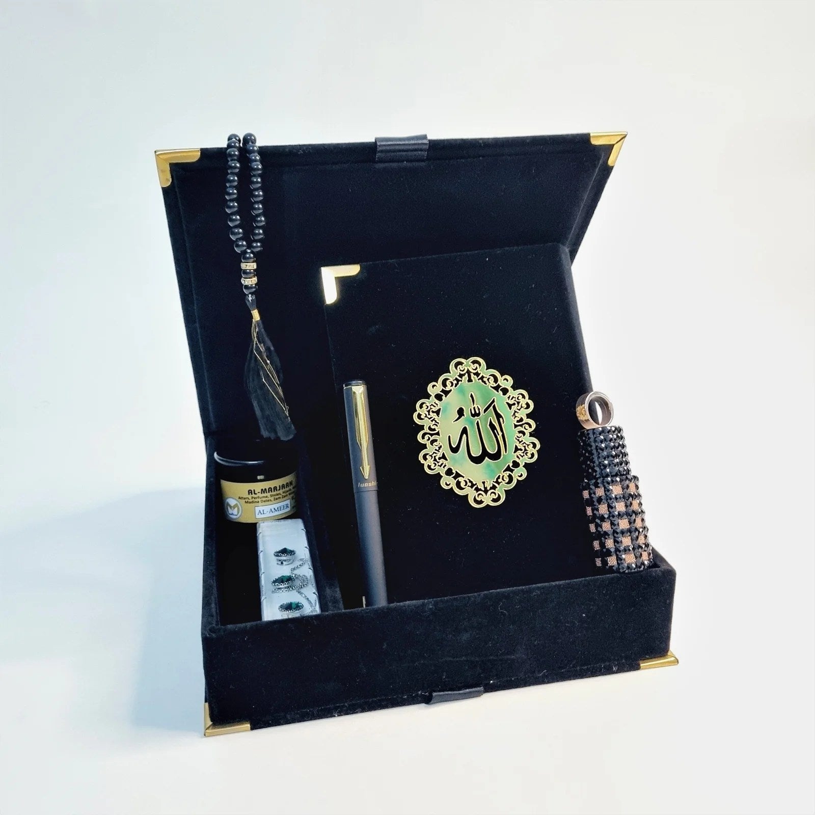 Royal Black Islamic Gift Box with velvet Quran, tasbih, bakhoor, attar, pen, and sherwani buttons.