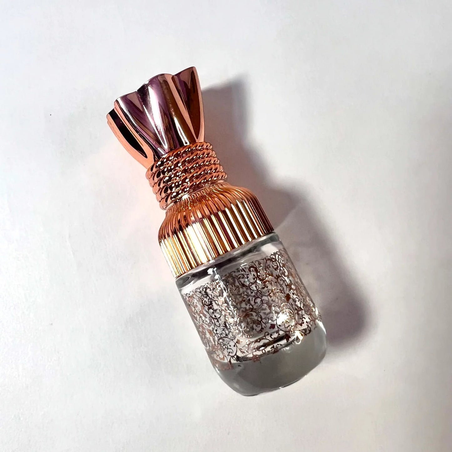 halal attar with floral bottle