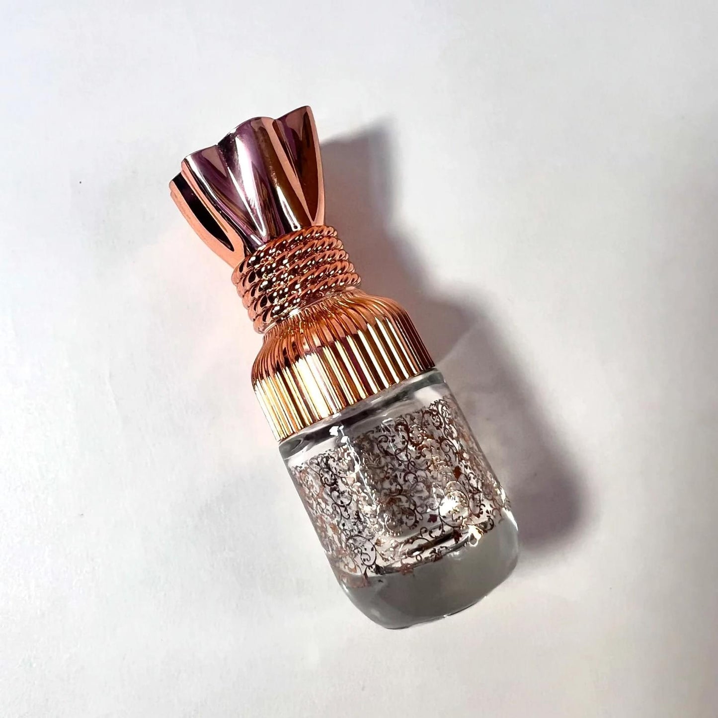 halal attar with floral bottle