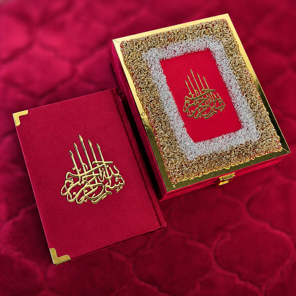 Decorative red book with gold embellishments on a matching red background