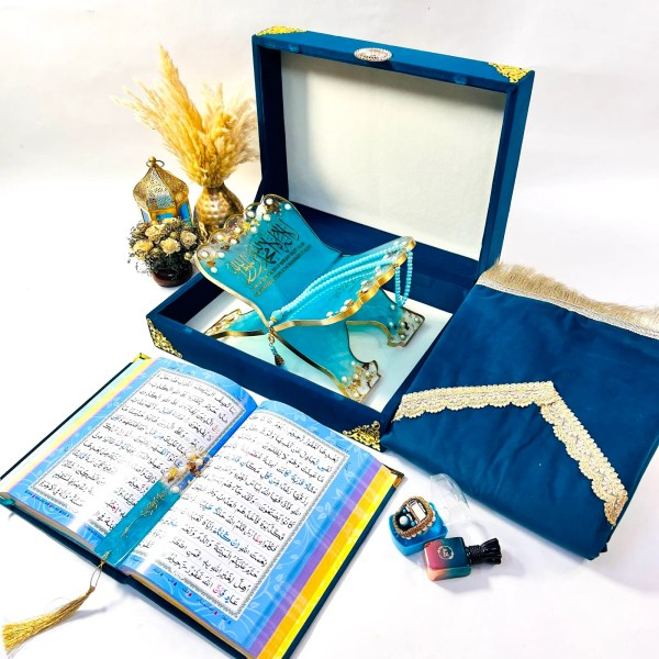Complete turquoise Islamic prayer essentials set with velvet Quran, Turkish mat, resin bookmark, and perfume.