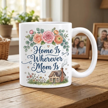 White Ceramic Mother's Day Mug with Home Is Wherever Mom Is Navy Calligraphy, Watercolor Floral Rose Arch, and Cozy Cottage Garden Illustration