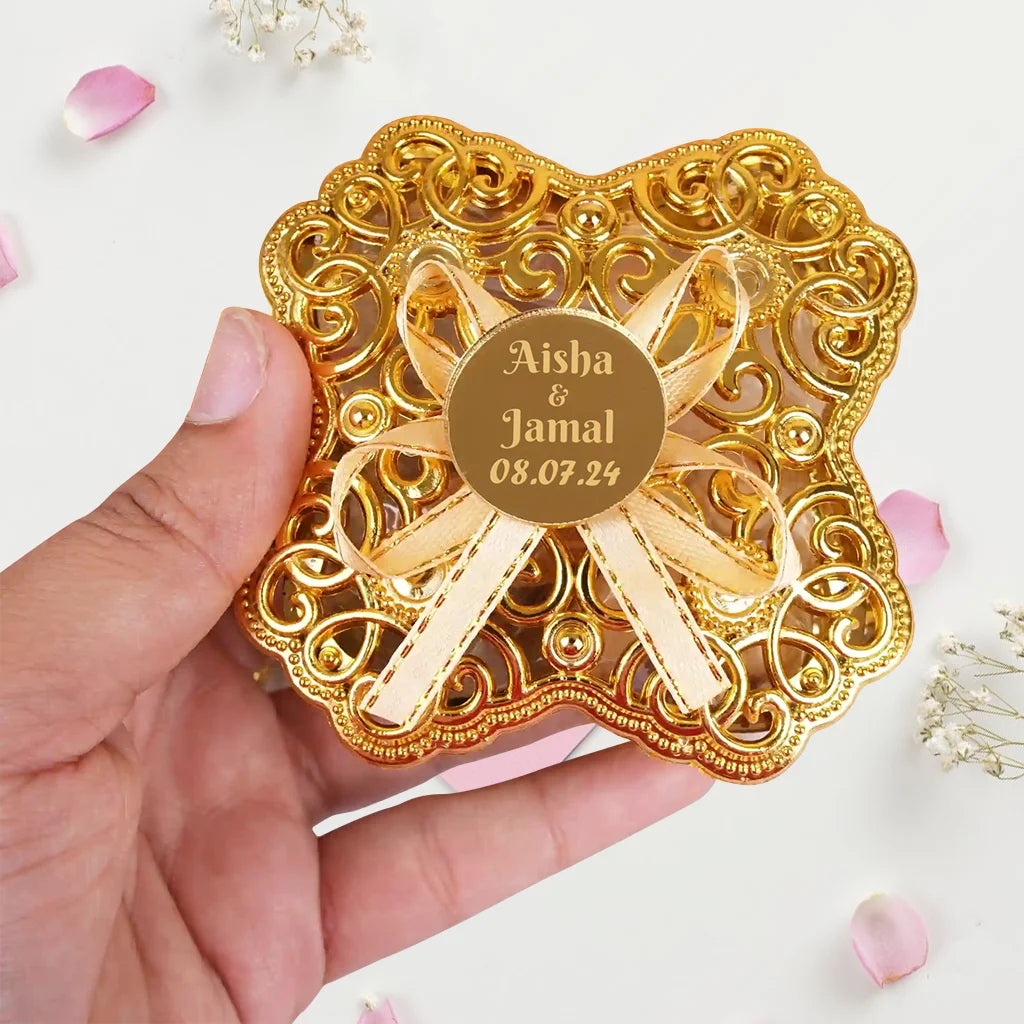 Personalized Golden Qubool Favor Box with Intricate Gold Filigree Design and Ribbon Bow Accent 2