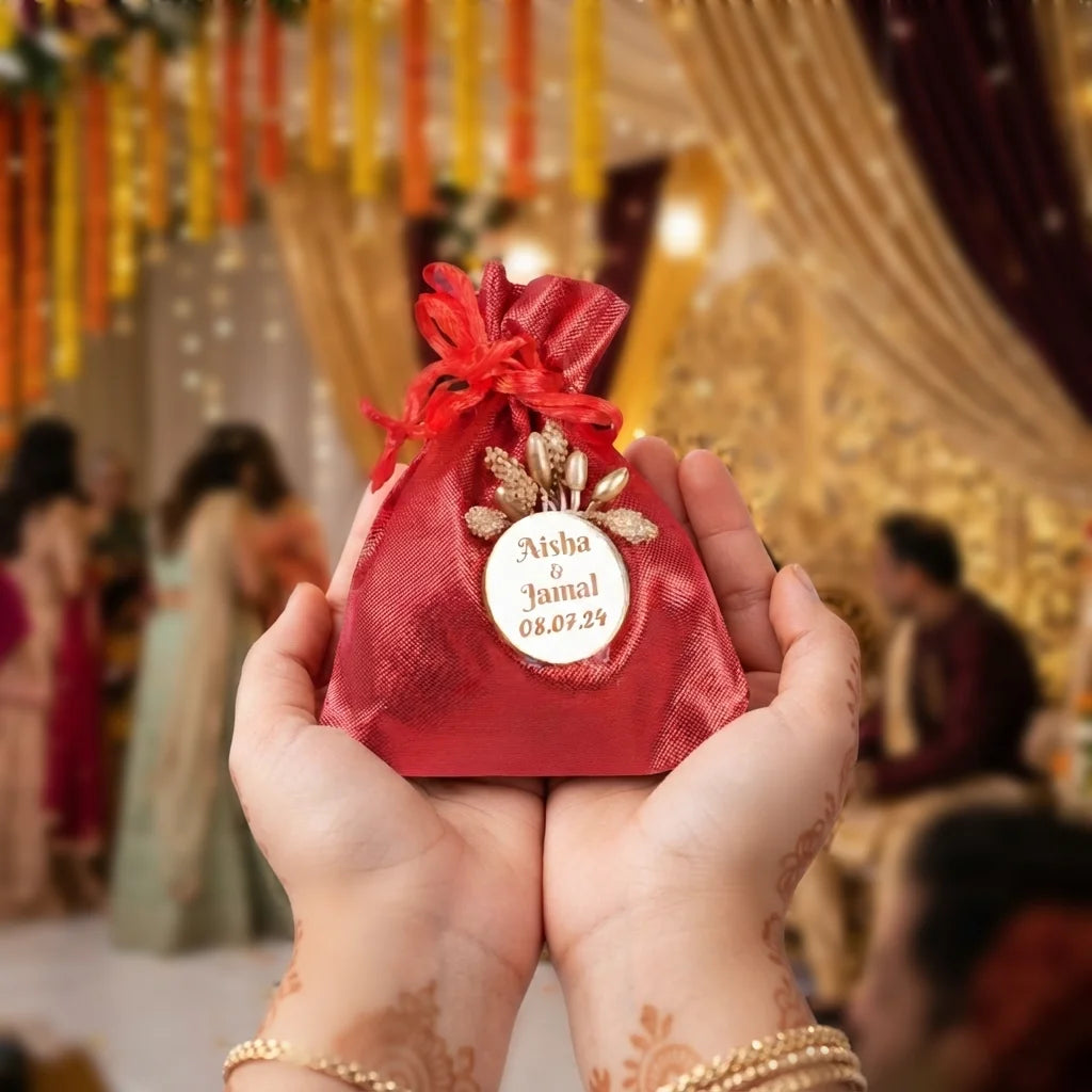 Personalized Red Metallic Nikah Favor Dry-Fruit Potli Bag with Gold Floral Emblem 4