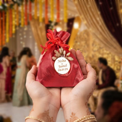 Personalized Red Metallic Nikah Favor Dry-Fruit Potli Bag with Gold Floral Emblem 4