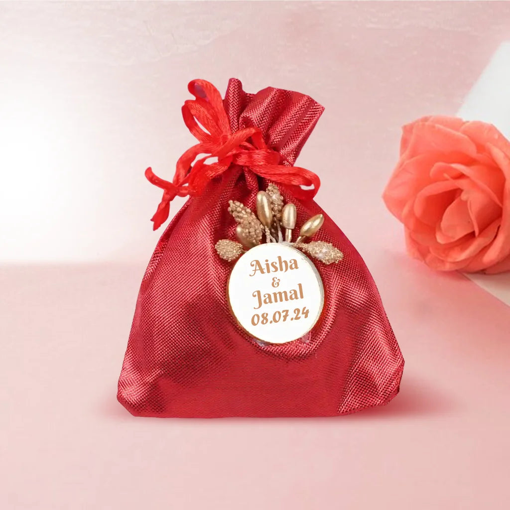 Personalized Red Metallic Nikah Favor Dry-Fruit Potli Bag with Gold Floral Emblem 5