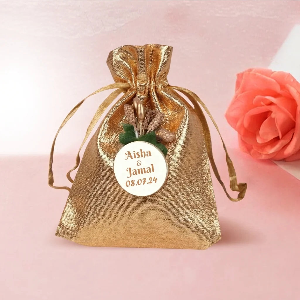 Personalized Red Metallic Nikah Favor Dry-Fruit Potli Bag with Gold Floral Emblem 2