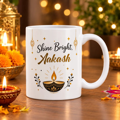 Personalized White Ceramic Diwali Mug with Glowing Diya Artwork, Hanging Lanterns, and Custom Name Script