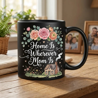 Black Ceramic Mother's Day Mug with Home Is Wherever Mom Is White Calligraphy, Watercolor Floral Rose Arch, and Cozy Cottage Garden Illustration