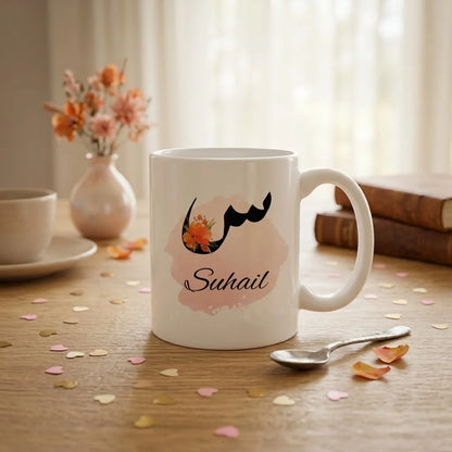 Personalized White Ceramic Mug with Floral Arabic Initial Calligraphy and English Name Script on Pastel Brushstroke