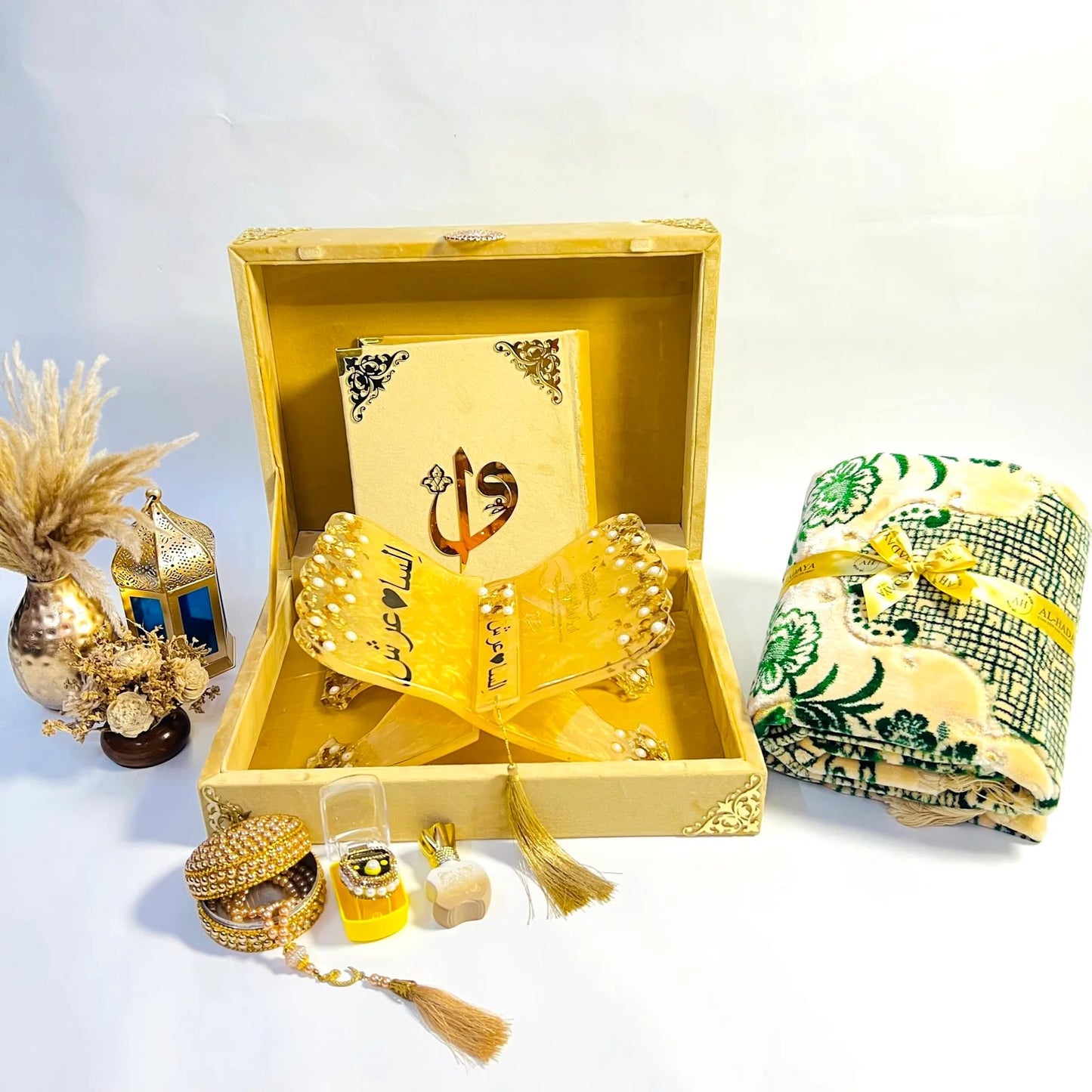 Flat-lay image of golden Islamic Quran gift set with rehal, tasbih, and bookmark – ideal for spiritual gifting.