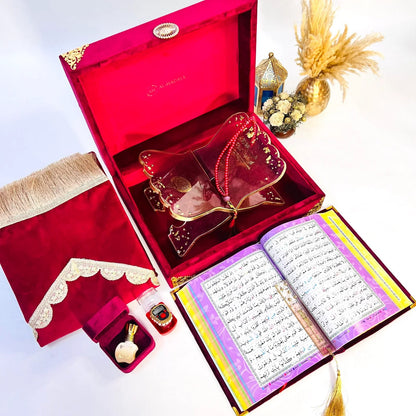 Al-Hadaya Hubb Al-Iman bridal Quran set in maroon velvet box with matching prayer mat, tasbih, bookmark, rehal and halal attar, ideal Islamic wedding gift
