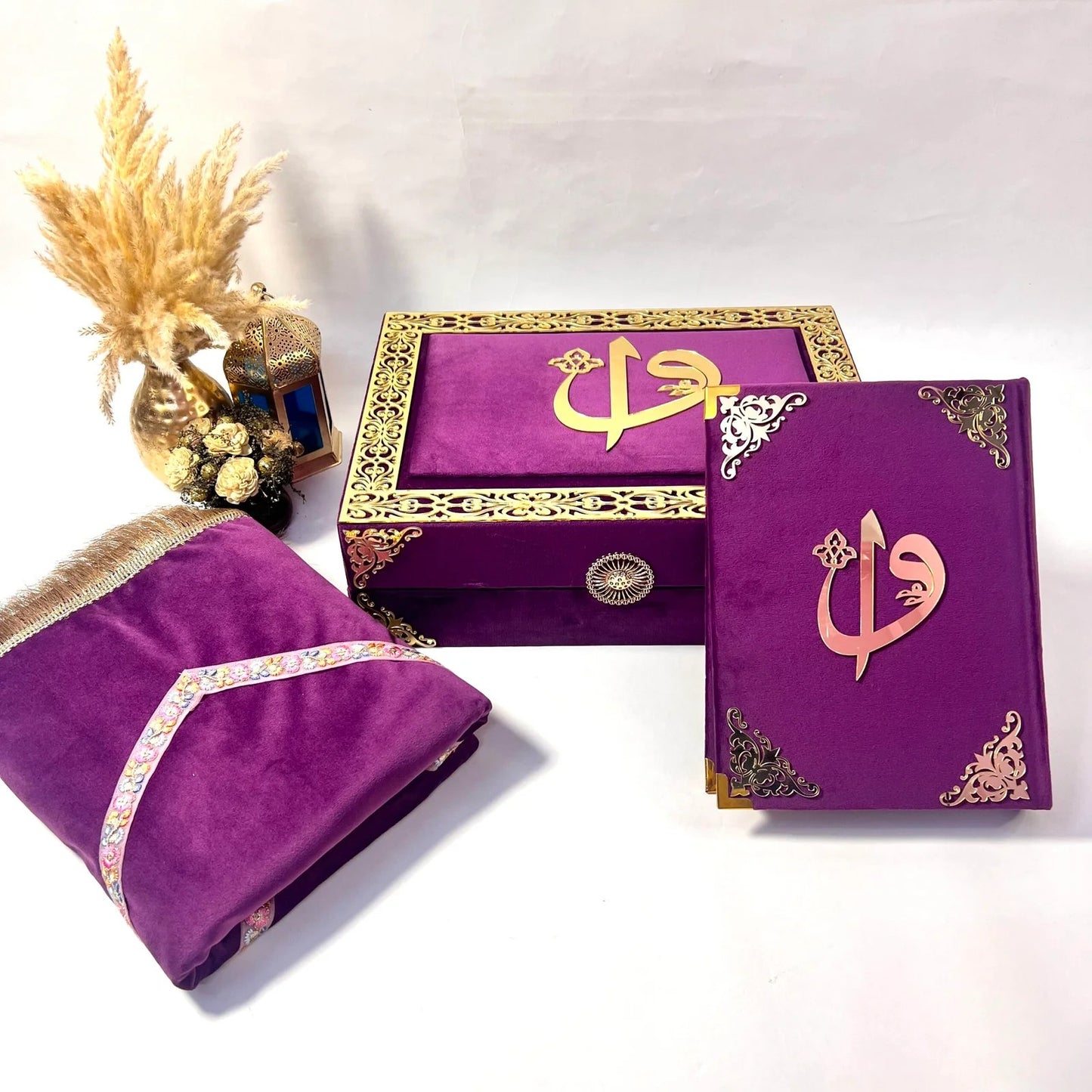 Elegant purple Quran box featuring Arabic letters Alif and Waw symbolizing divine unity and devotion.