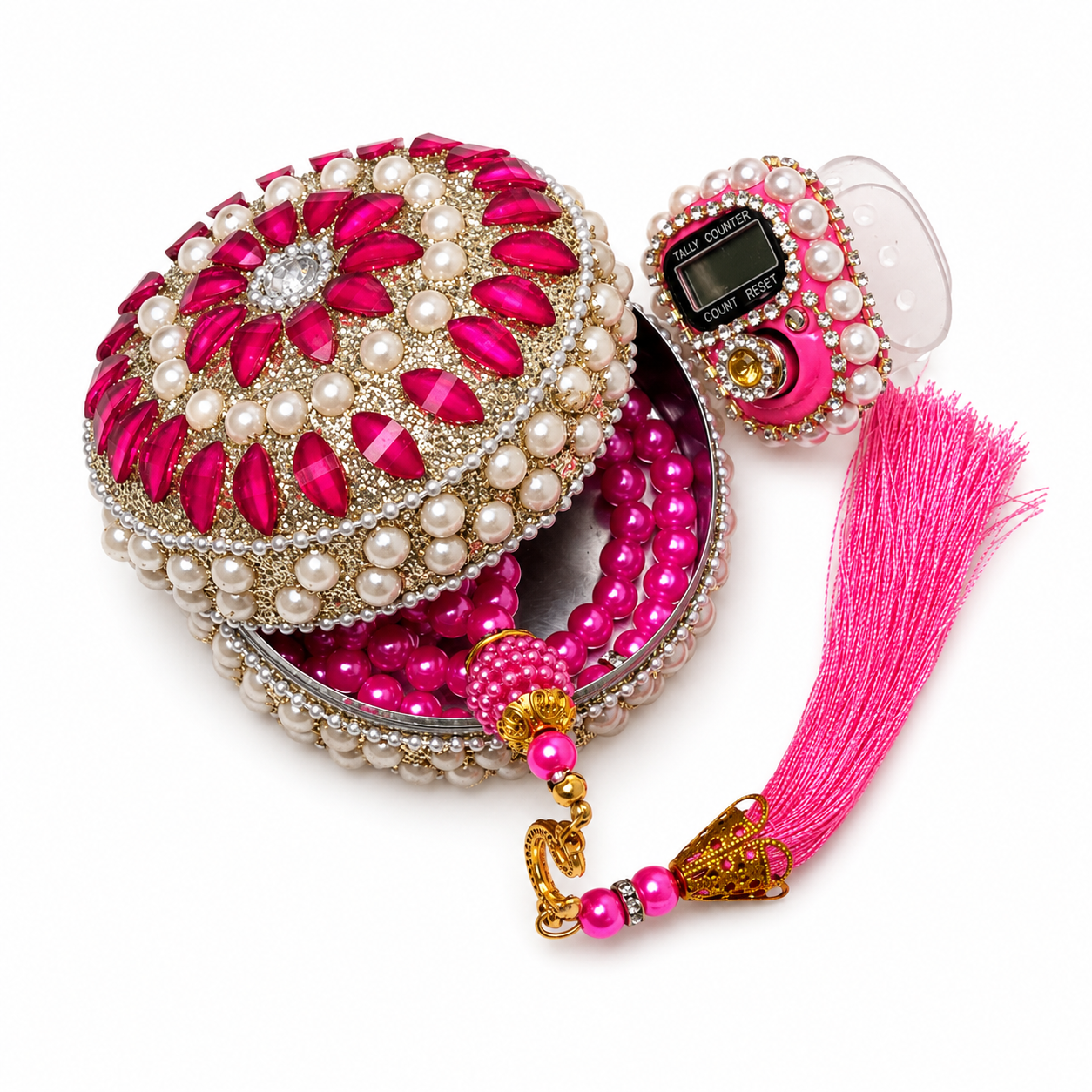Decorative jewelry box with pink and white pearls and a matching necklace on a white background
