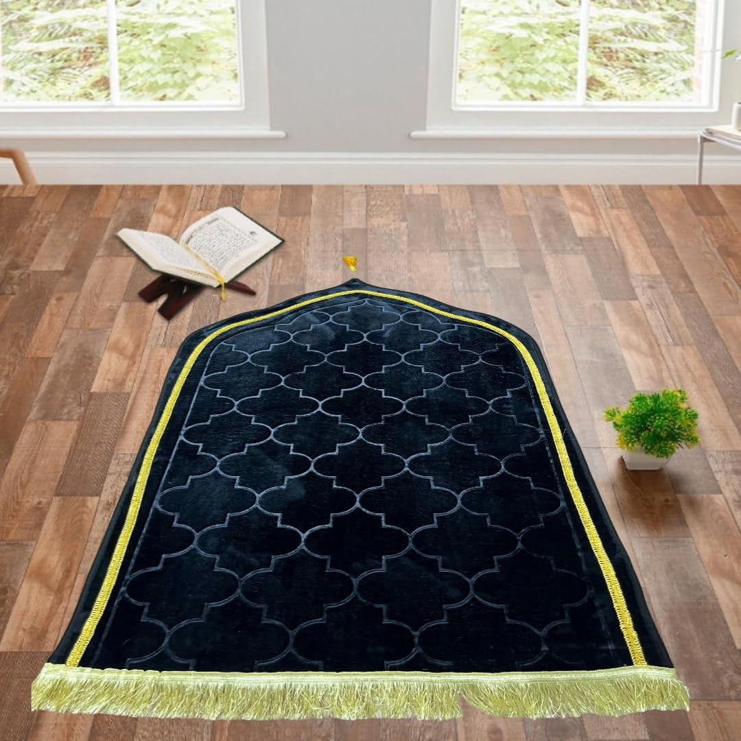 Black velvet dome-shaped prayer rug with golden trim, luxurious thick design for elegant home decor.