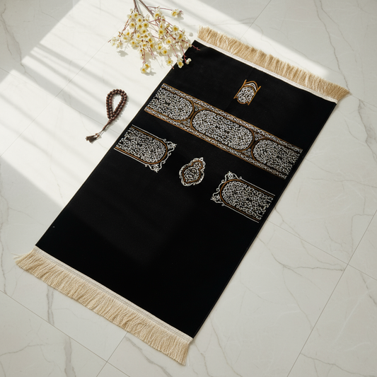 Luxury Chenille Kiswa Kaaba inspired Islamic prayer rug, premium comfortable black Muslim prayer mat for daily Salah and gifting.