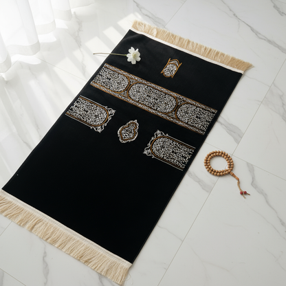 Luxury Chenille Kiswa Kaaba inspired Islamic prayer rug, premium comfortable black Muslim prayer mat for daily Salah and gifting.
