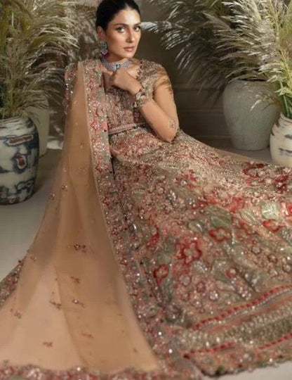 Designer bridal outfit for Indian weddings with intricate craftsmanship and rich detailing.