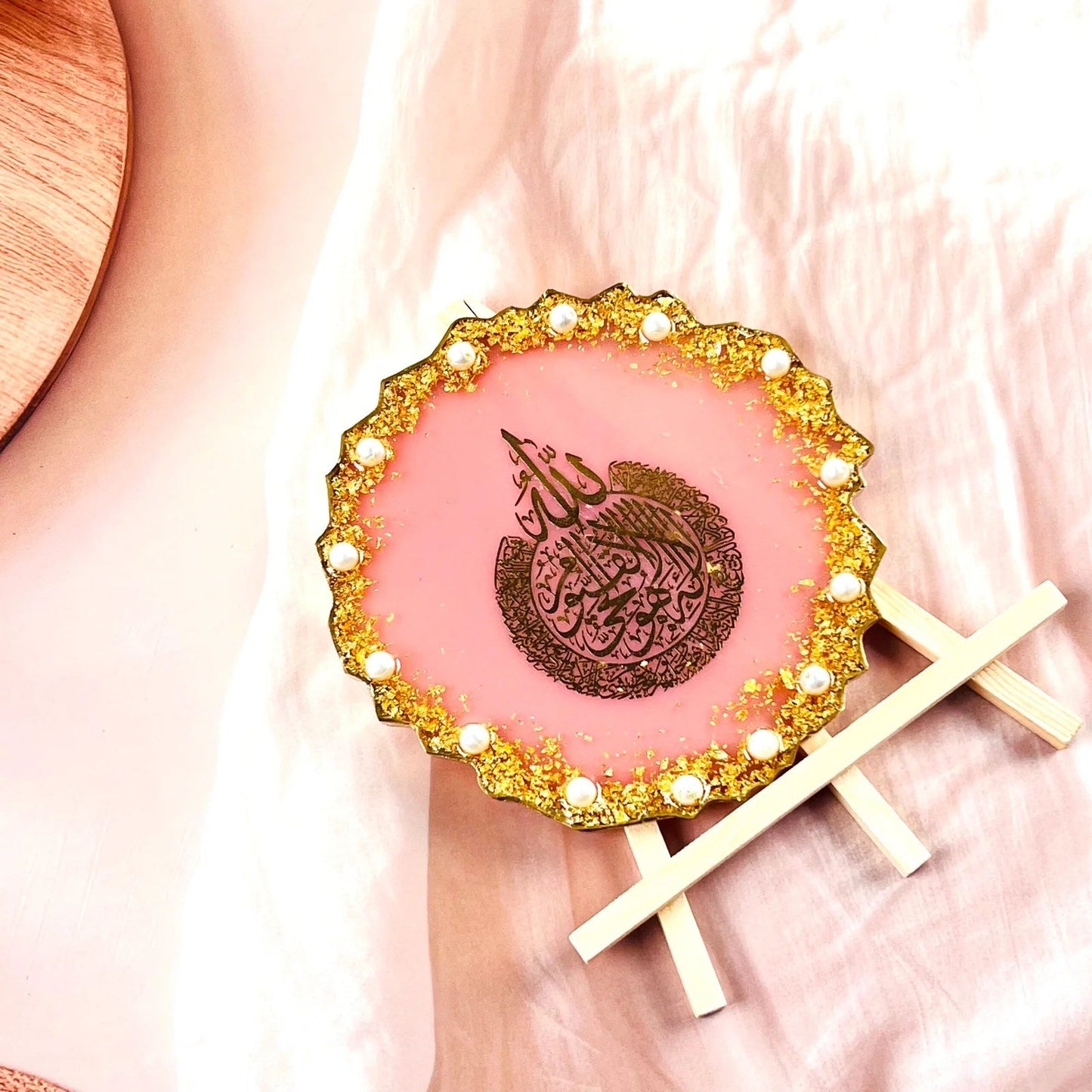 Elegant resin plaque featuring Ayatul Kursi calligraphy, decorative gold and pink stones, ideal for table or wall display in Islamic homes.