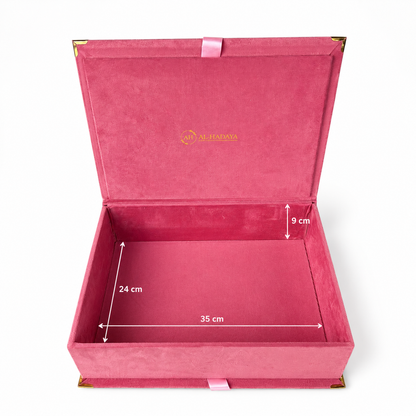 An open pink velvet gift box with gold corner accents and a pink ribbon tab, shown on a white background with overlaid dimension lines and text indicating 35 cm width, 24 cm depth, and 9 cm height.