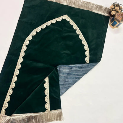 Premium handmade velvet janamaz in olive green with gold detailing.