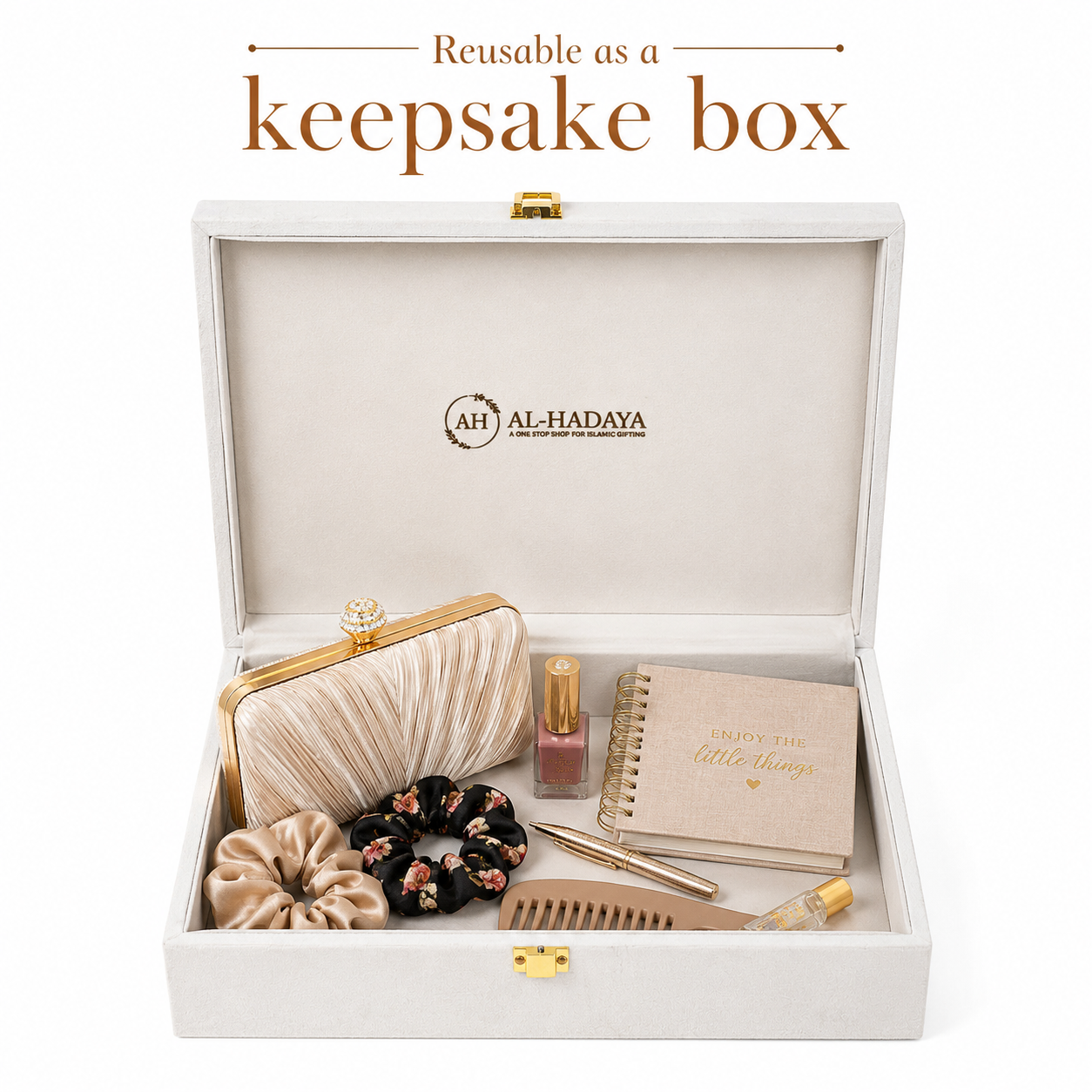 An open keepsake box set displayed on a white background with text at the top reading 'Reusable as a keepsake box.' The box is light beige/ivory with gold-tone hardware and the brand name AL-HADAYA printed inside the lid.