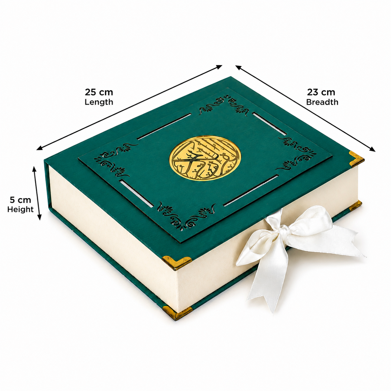 A decorative book-shaped gift box or keepsake box shown on a white background with measurement arrows and labels indicating 25 cm length, 23 cm breadth, and 5 cm height. The box has a dark teal-green cover with gold corner accents, a gold circular emblem on the lid, cream-colored pages visible along the side, and a white ribbon tied in a bow.