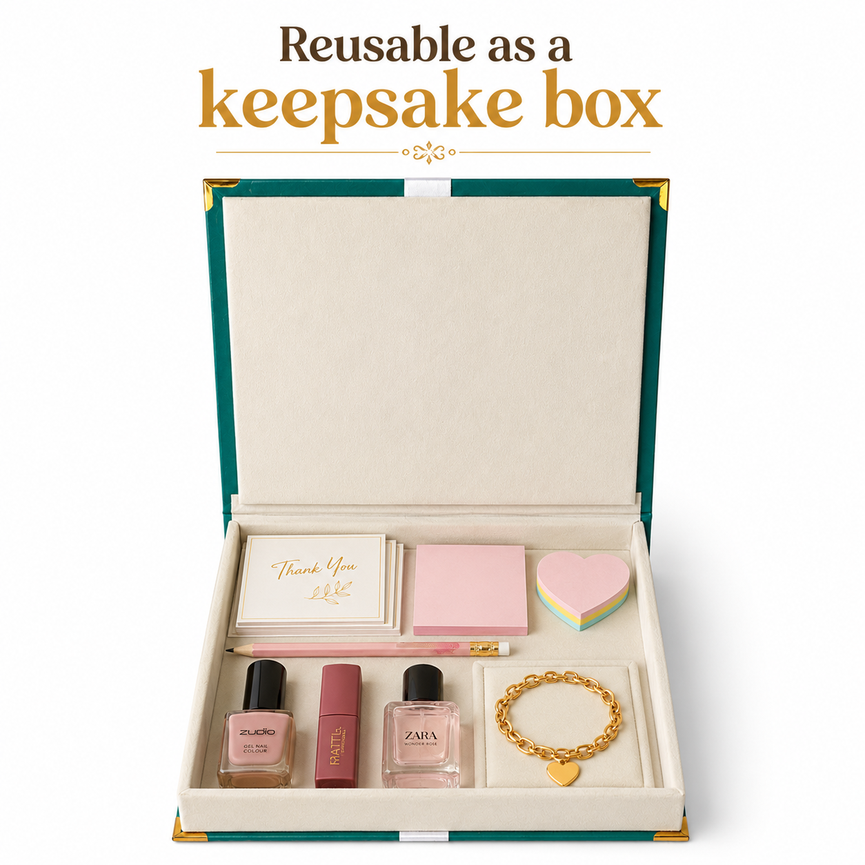 An open keepsake box set with a teal-green and gold hardcover, cream interior, and gift contents including a thank you card, pink sticky notes, a pink heart-shaped box, nail polish, perfume, and a gold heart charm bracelet. Text above reads 'Reusable as a keepsake box'.
