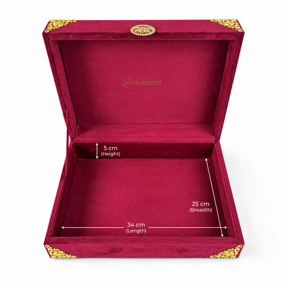 An open burgundy velvet jewelry box with gold corner accents and a gold clasp, shown on a white background with overlaid dimension lines and text indicating height, length, and breadth.