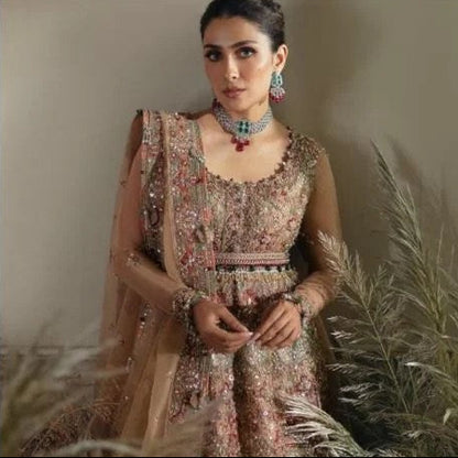 Elegant handmade Indian wedding maxi dress with embroidery and embellishments.