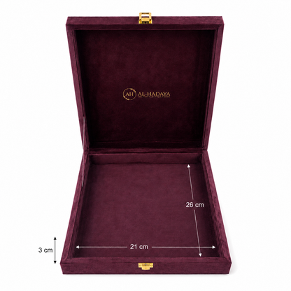 An open burgundy velvet jewelry box with gold-tone latches, shown on a white background with dimension annotations indicating 21 cm width, 26 cm height, and 3 cm lid height. The brand name 'ALHADAYA' is printed inside the lid.