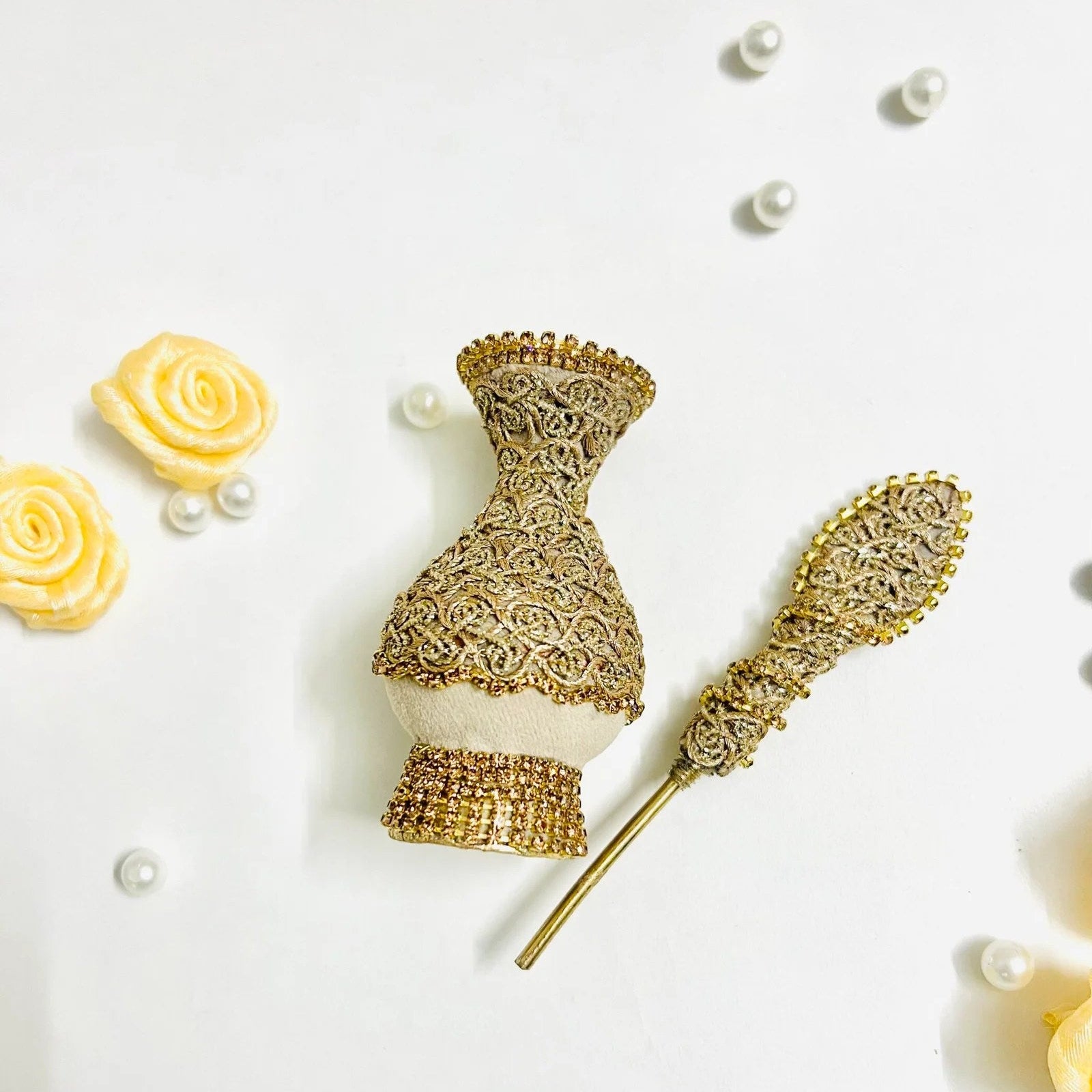 Luxury ivory and gold surma holder used in traditional Muslim weddings.