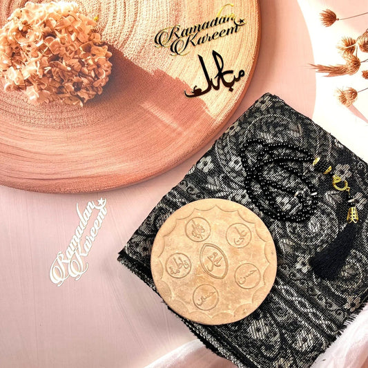 Authentic Karbala soil Turbah with Quran, Tasbeeh, and Turkish prayer mat in a luxury gift box.