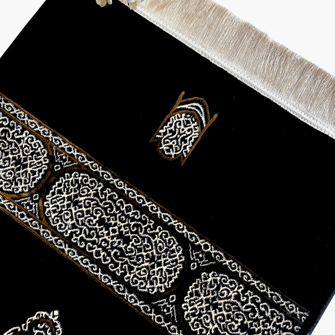 Luxury Chenille Kiswa Kaaba inspired Islamic prayer rug, premium comfortable black Muslim prayer mat for daily Salah and gifting.