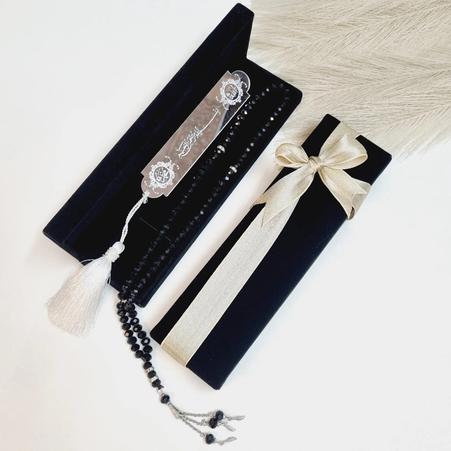 Elegant Islamic gift set featuring black velvet box, crystal prayer beads, and acrylic bookmark.