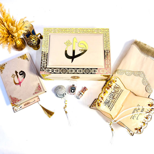 Luxury Hubb Al-Iman Quran gift set by Al-Hadaya with velvet-covered rainbow Quran, Turkish prayer mat, resin rehal, tasbih, attar and velvet box