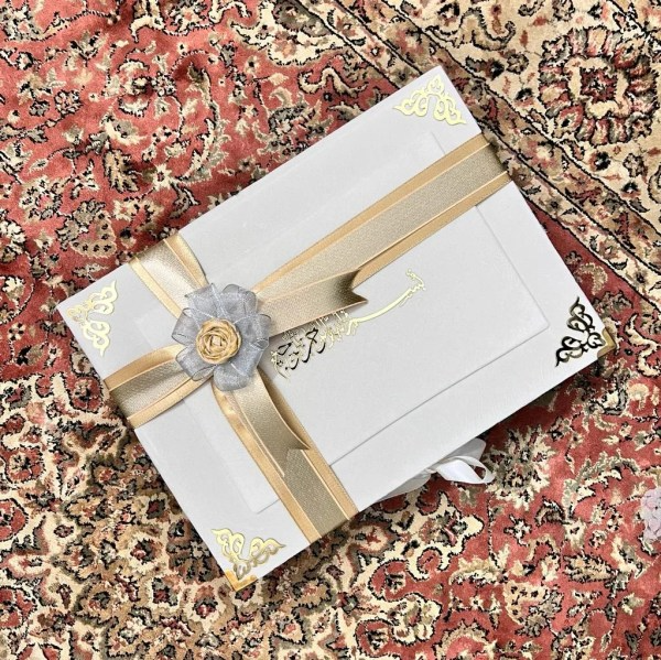 Luxury velvet Quran gift set with pearl-white box, rainbow Quran, Turkish prayer mat, pearl tasbih, and halal oud attar – perfect Islamic wedding and Eid gift.