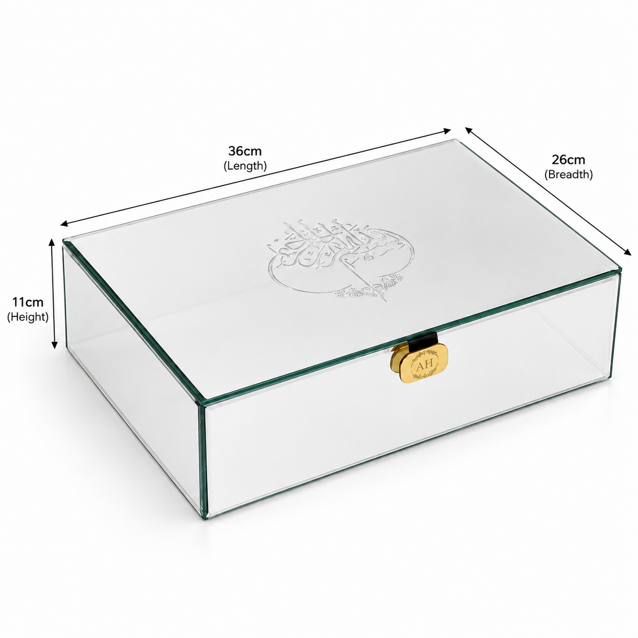 Clear glass rectangular storage box with a gold clasp and Arabic calligraphy engraving on the lid, shown with dimension labels indicating 36cm length, 26cm breadth, and 11cm height.