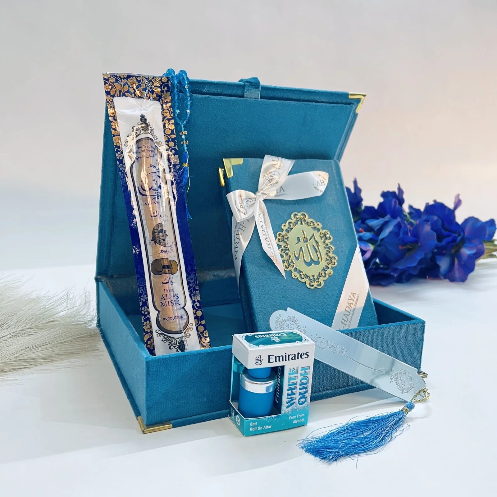 Royal turquoise velvet Quran gift box with matching prayer beads and halal perfume.