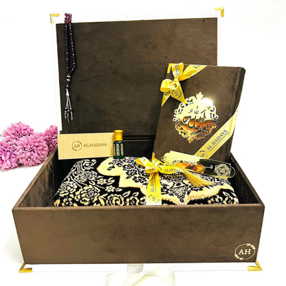 Handmade velvet keepsake box with Quran, prayer mat, tasbih, and Bismillah bookmark.